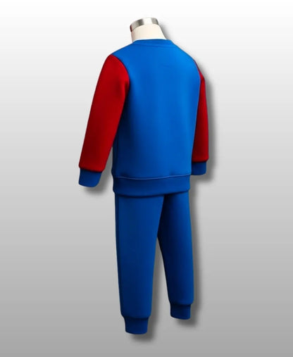 Blue and red tracksuit on a mannequin against a gray background