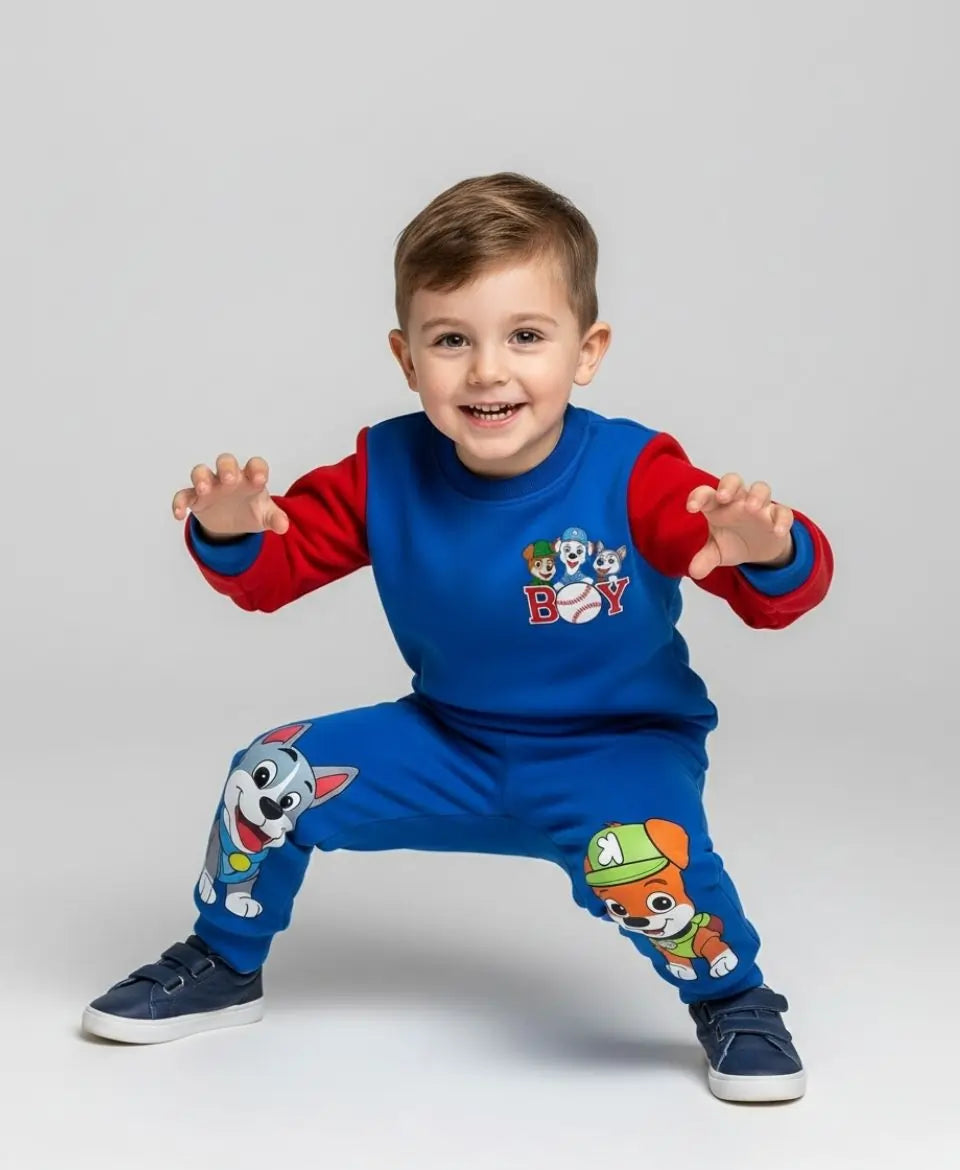 Child wearing a blue and red outfit with cartoon character design on a light gray background