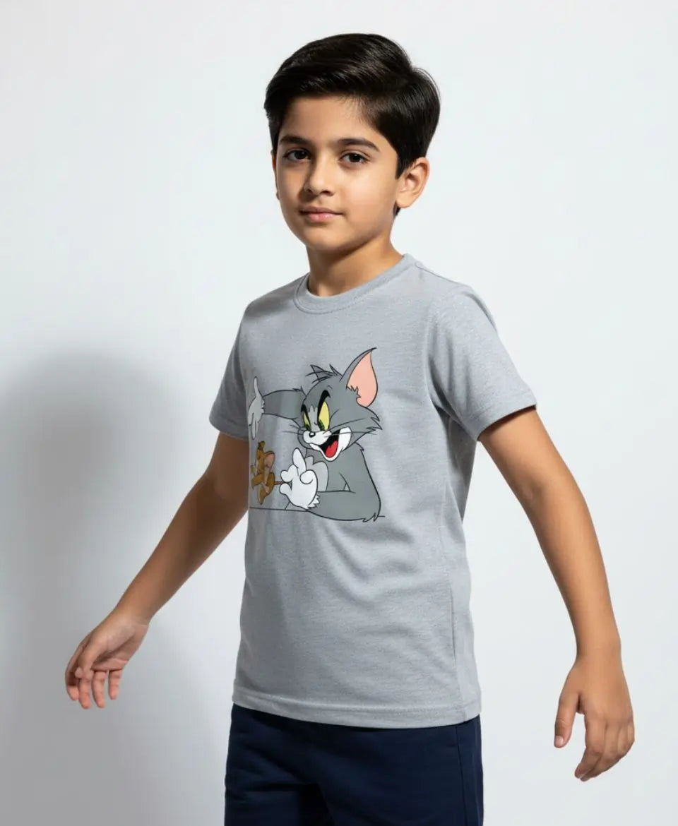 Child wearing a gray t-shirt with a cartoon character on a white background