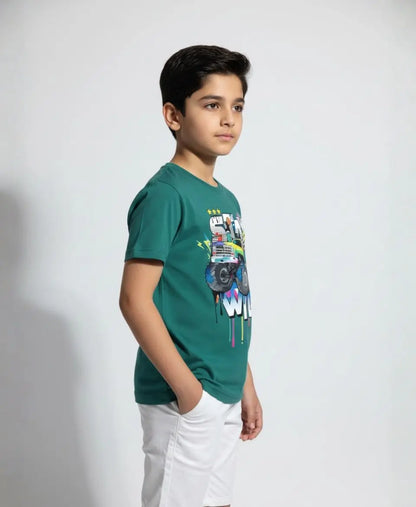 Child wearing a green t-shirt with a colorful graphic design on a white background