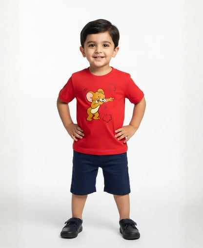 Child wearing a red t-shirt with a cartoon character on a white background