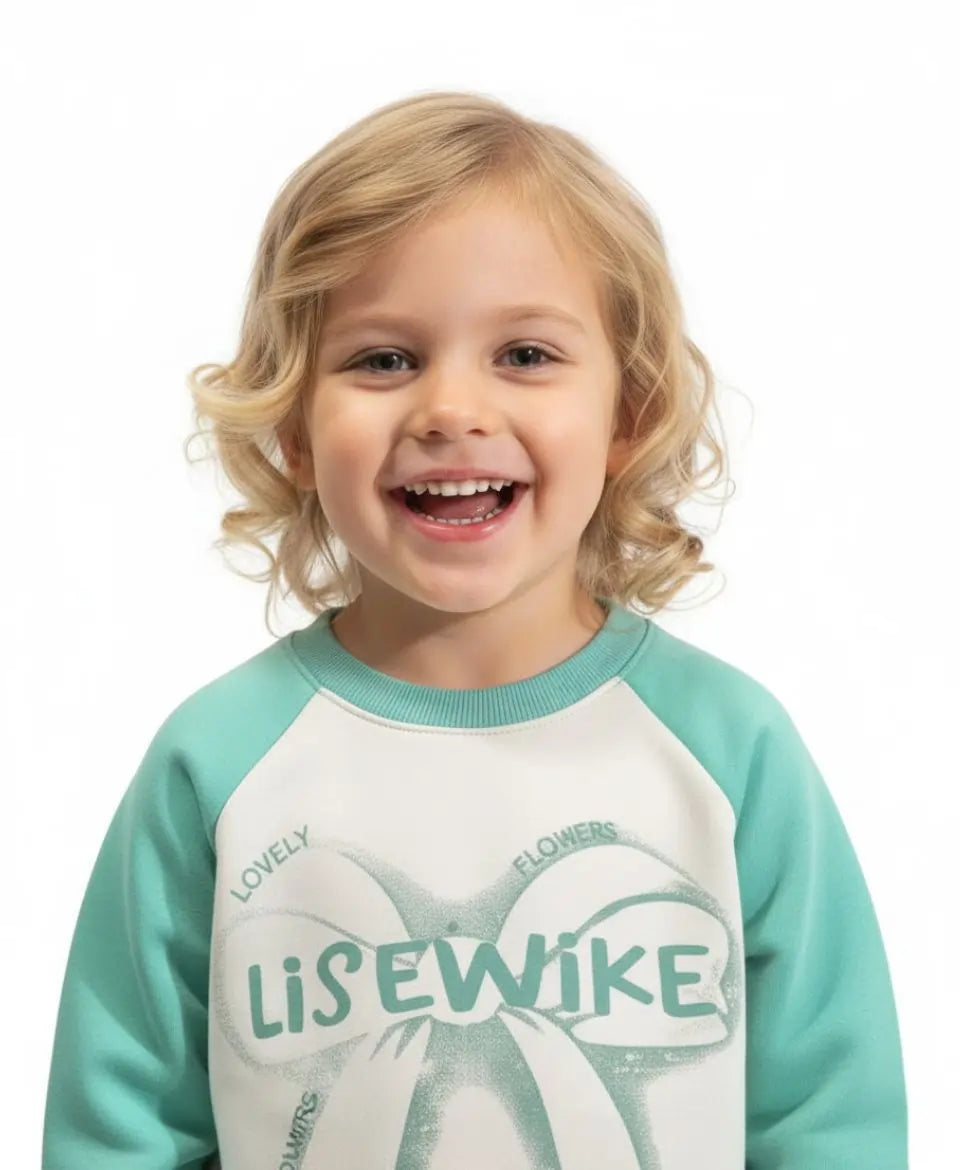 Child wearing a teal and white shirt with 'Lise Wike' branding on a white background