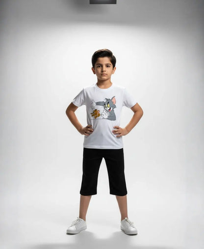 Child wearing a white t-shirt with a graphic design on a gray background