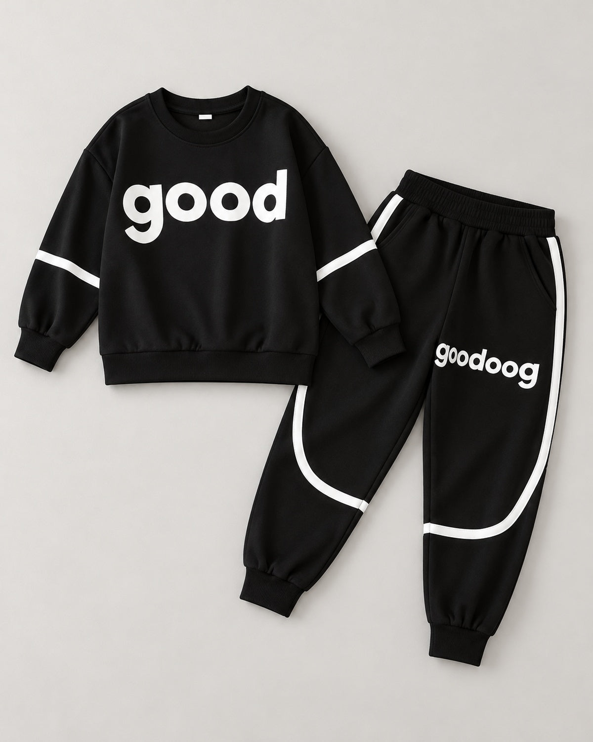 Black Good print kids sweatshirt and jogger set with white piping, AI-styled catalogue image