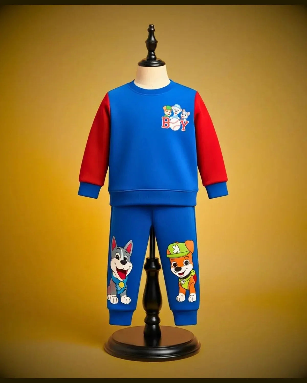 Children's blue and red outfit with cartoon characters on a yellow background