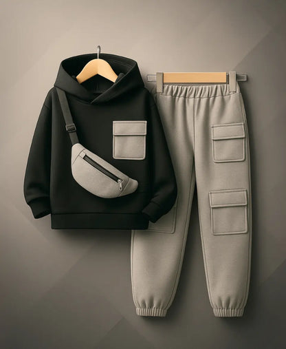 Happy Kidi Black hoodie with front pocket and gray pants with multiple pockets on a gray background