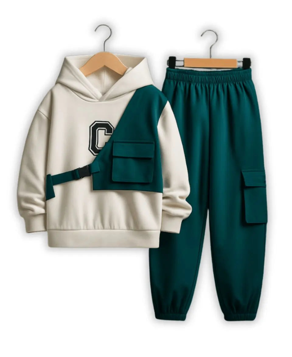 White hoodie with green accents and green pants on hangers against a white background