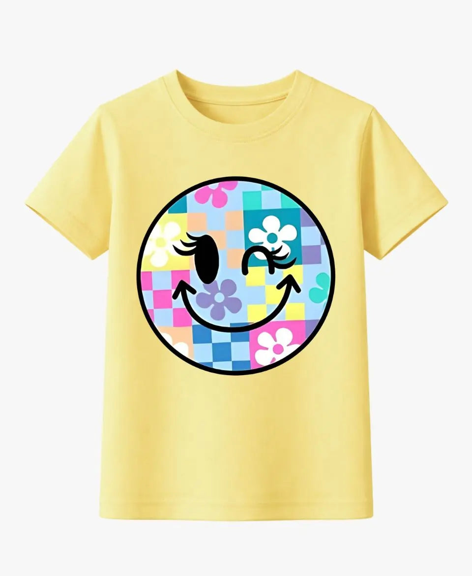 Yellow t-shirt with a colorful smiley face design on a white background
